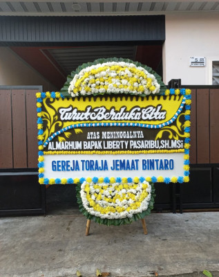 Papan Bunga Duka di Pagutan